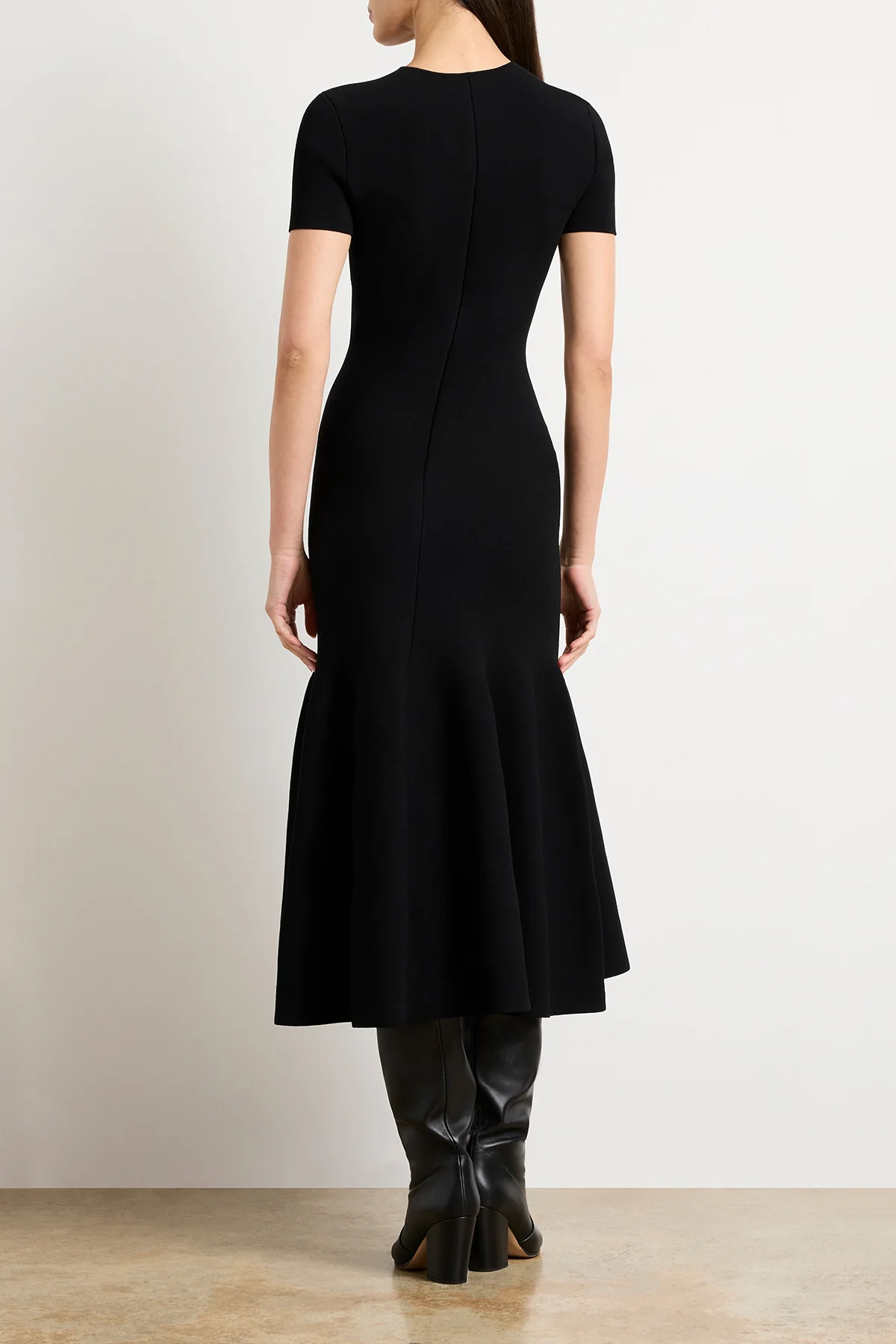 The Willa Knit Dress with Trumpet Skirt in Black - Image 5